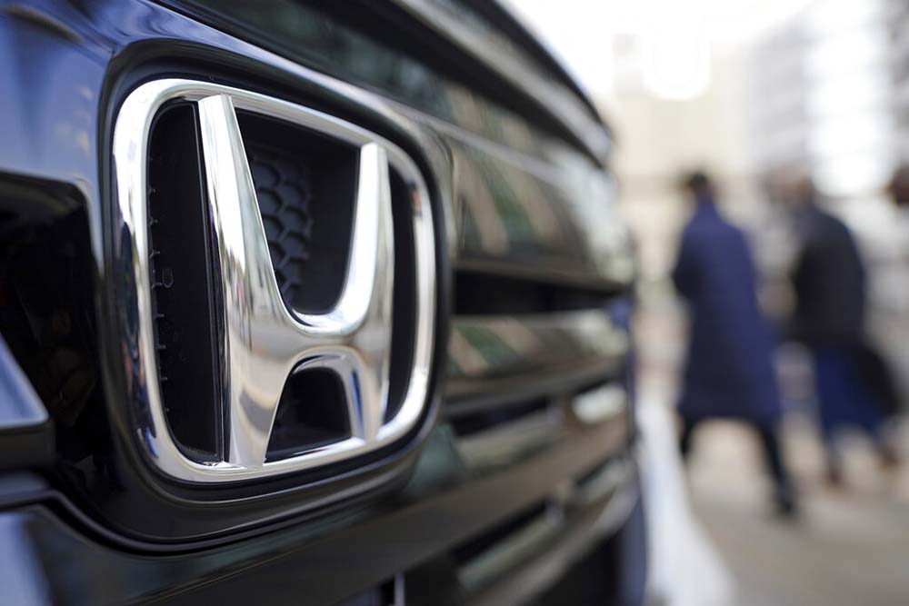 Honda&#8217;s sales, profit drop amid rising costs, chip shortages