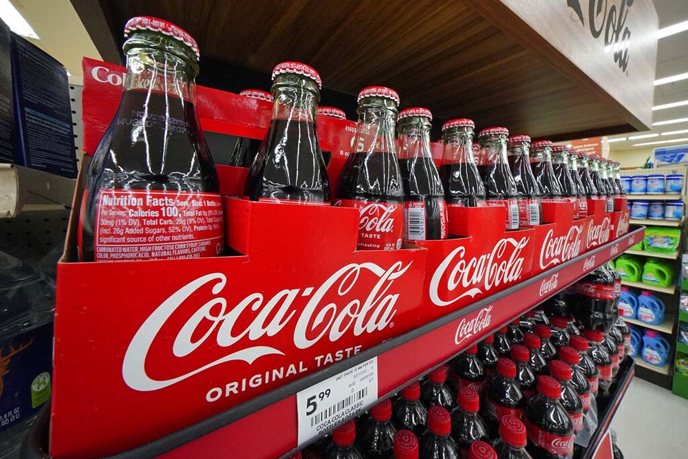 Coke sees slower growth ahead as price hikes moderate