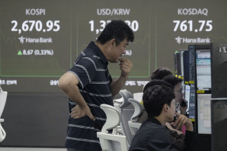 Asian shares trade higher on moderate optimism about tech companies and global economy