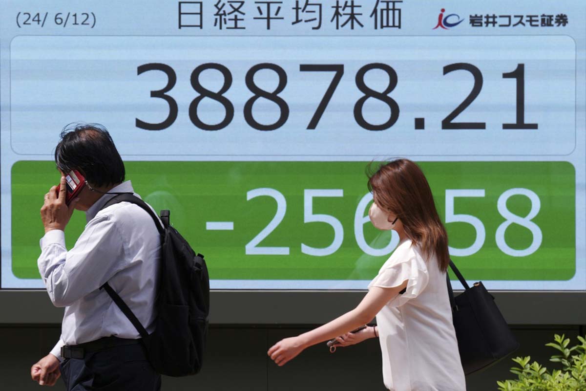 Stock market today: Asian shares are mostly lower ahead of Fed decision on interest rates