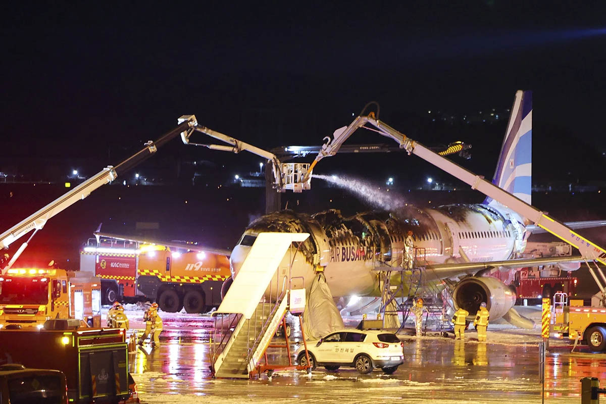 All 176 people aboard evacuated as passenger plane catches fire in South Korean airport 